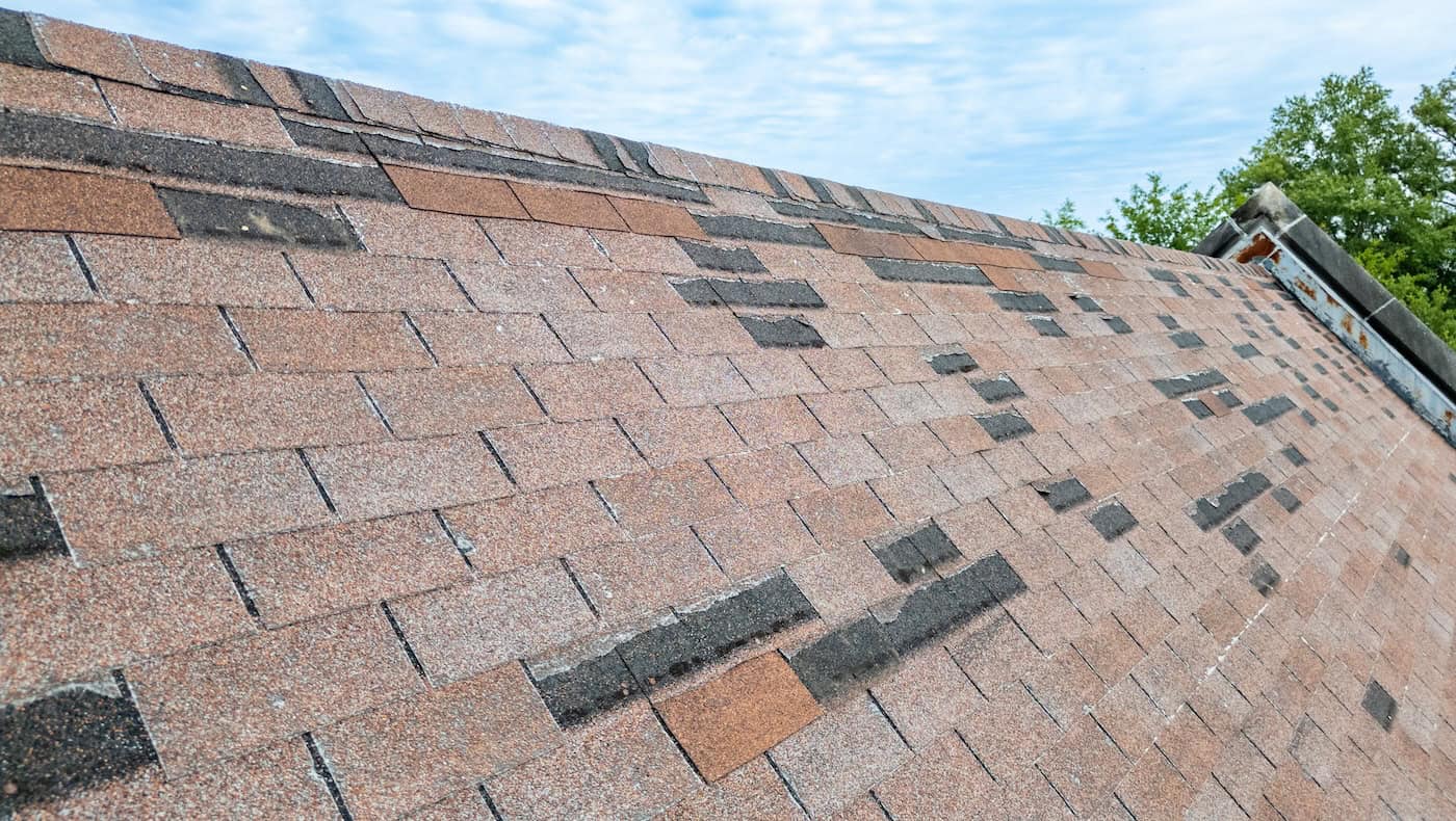 Rood in need of repair, missing shingles from storm damage
