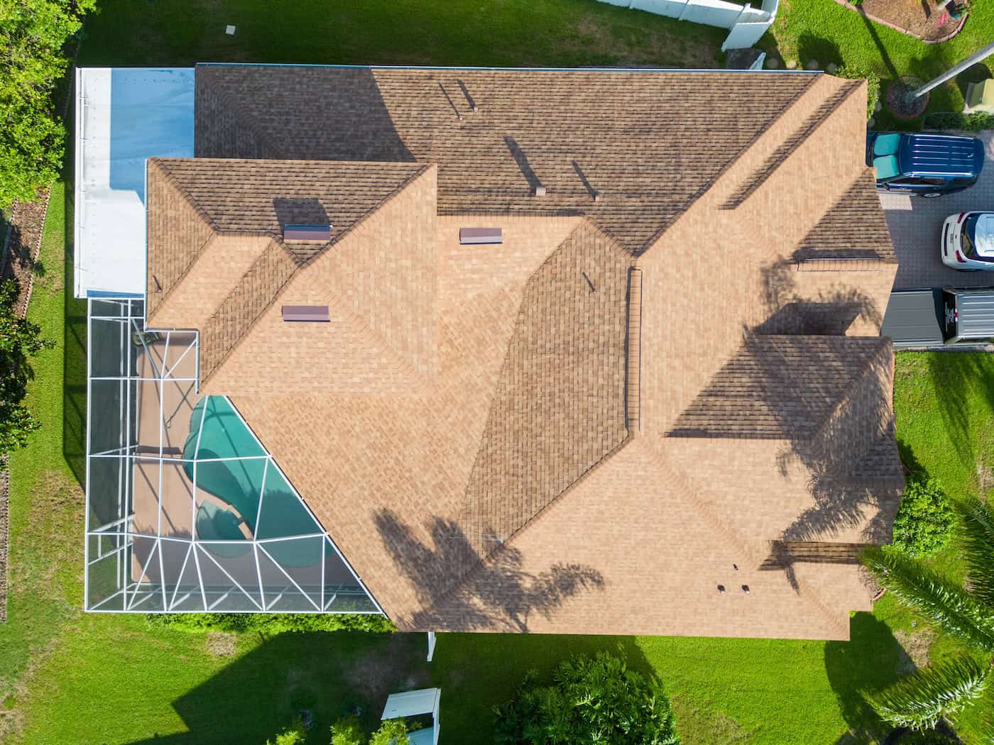 Florida Home with Screened Pool and Roof by the Water from Above