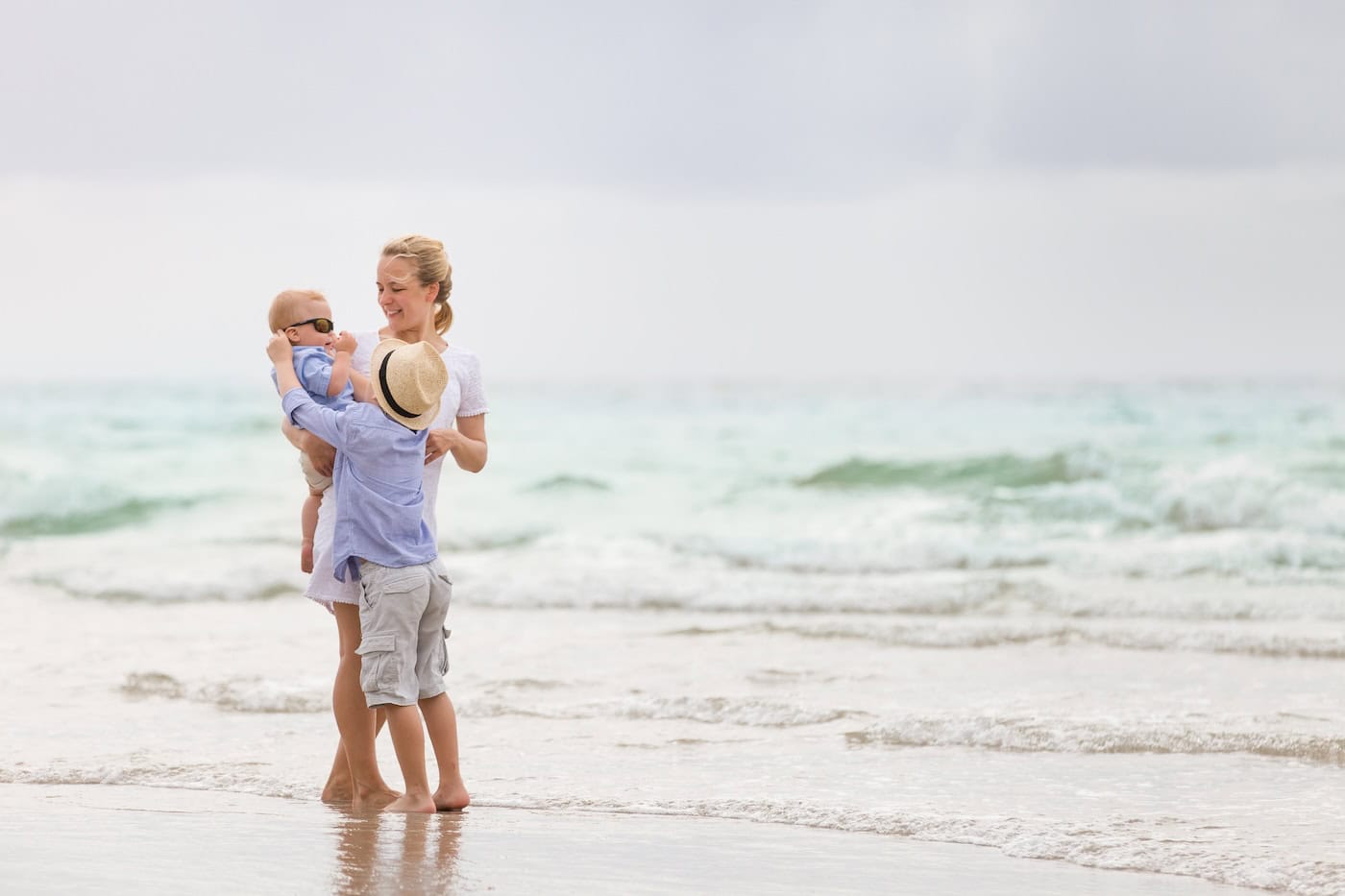 Top view of leaking house roof covered with protective tarp sheets against rain water leaks until replacement of asphalt shingles. Damage of building rooftop as aftermath of hurricane Ian in Florida.