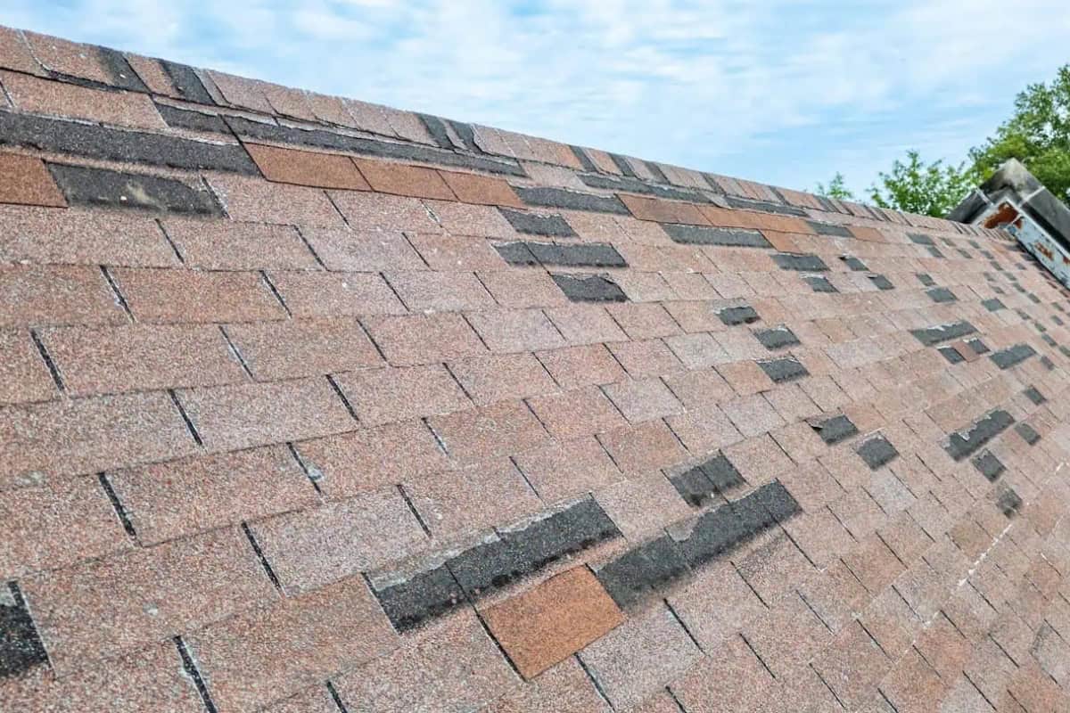 Rood in need of repair, missing shingles from storm damage