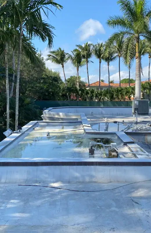 Photo of a partially cleaned metal roof to show the stark contrast between cleaned and not cleaned.