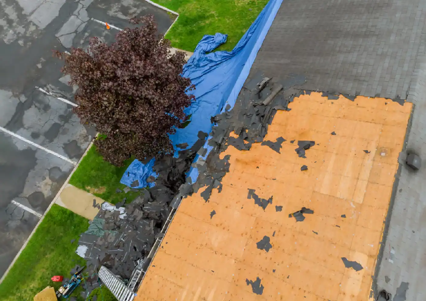 Waterproofing coating being applied to flat roof